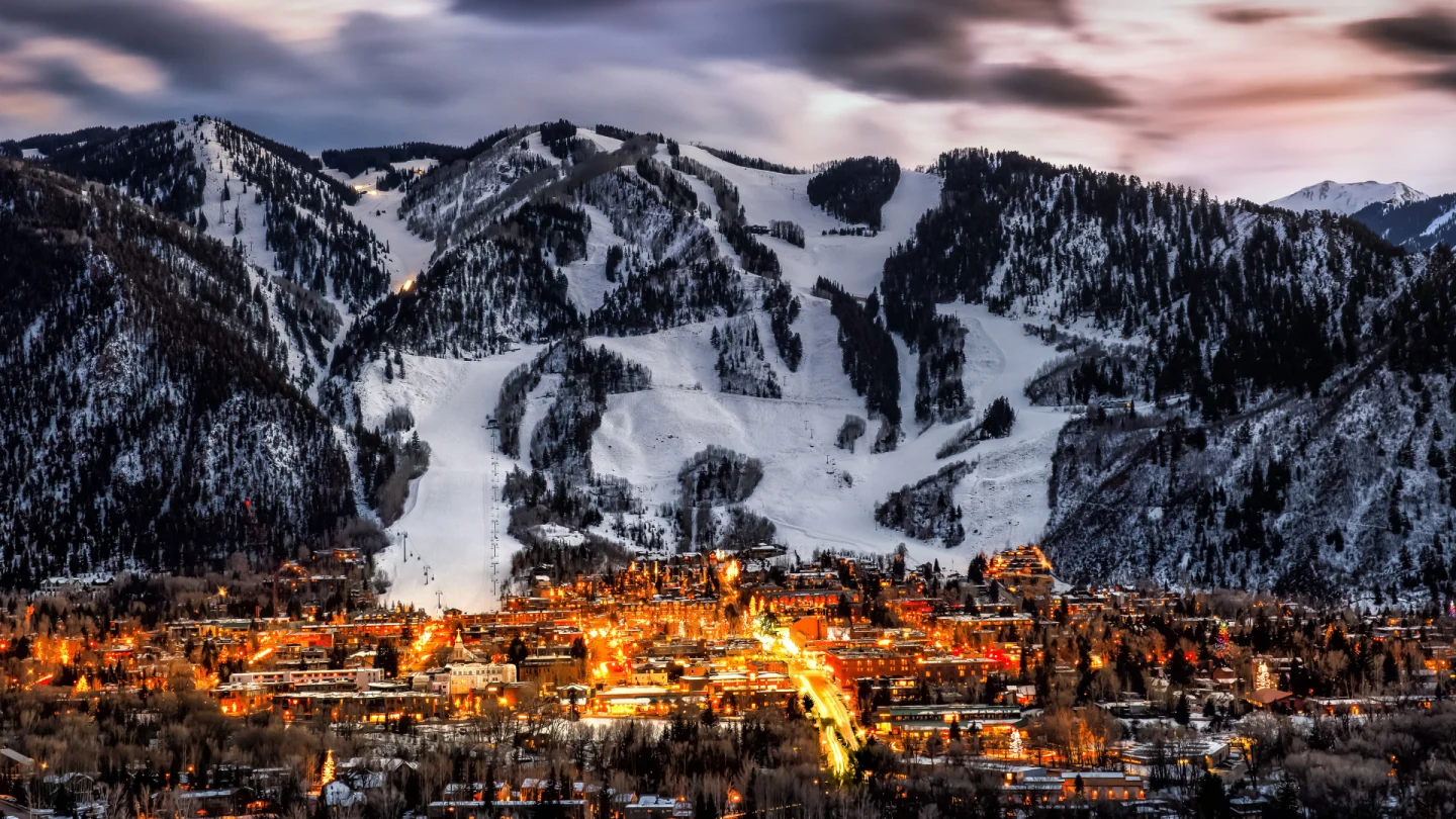 Evening landscape of a Colorado ski slope and mountain town